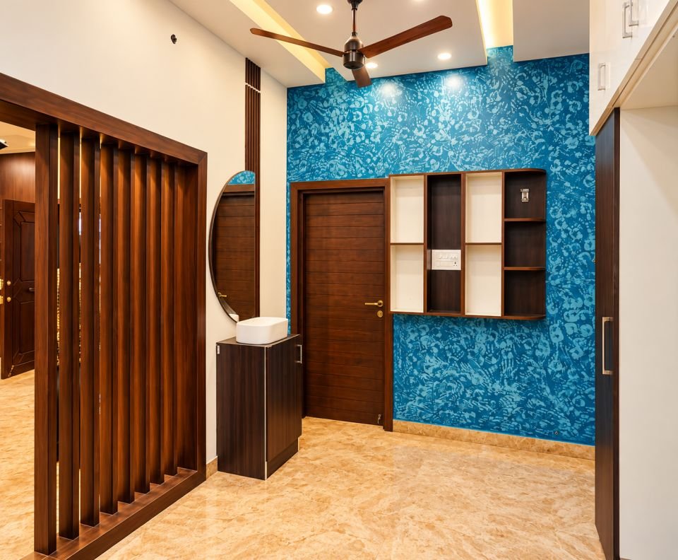 Foyer with wooden slat partition and blue textured wall