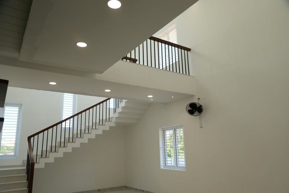 Staircase seen from the double-height hall