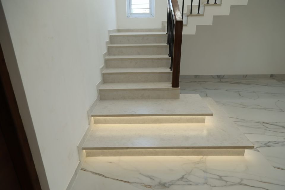 Staircase with lit first steps