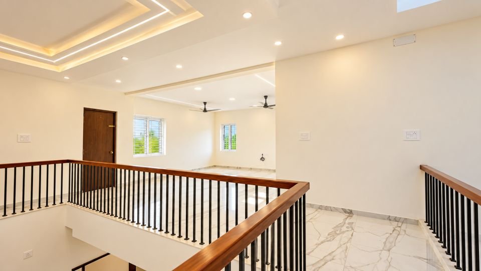 First floor landing with wood and metal railing