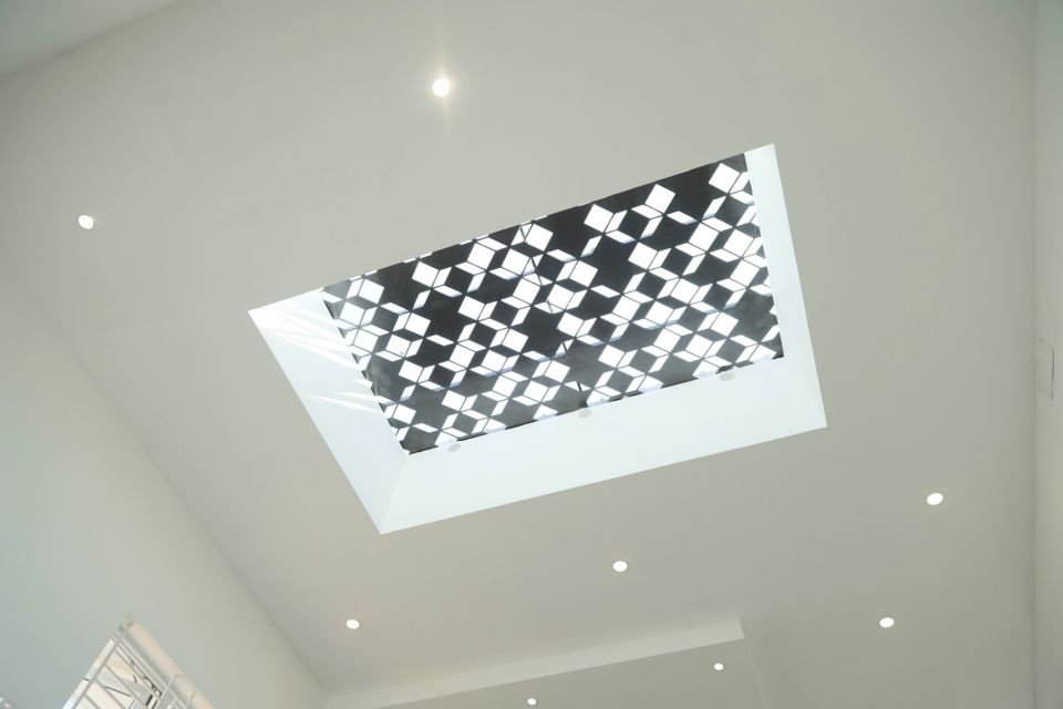 Skylight with patterned grille