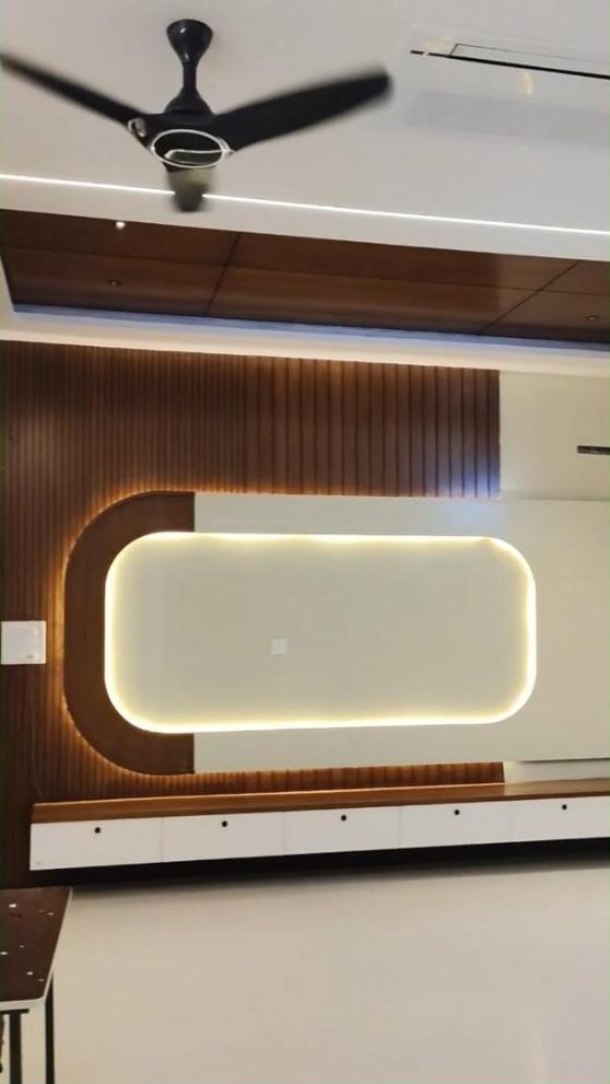 Backlit TV wall with fluted wood panelling